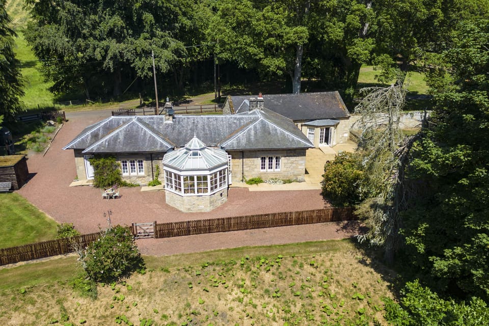 Eslington Lodge sits within the pretty scenery of Eslington Park Estate