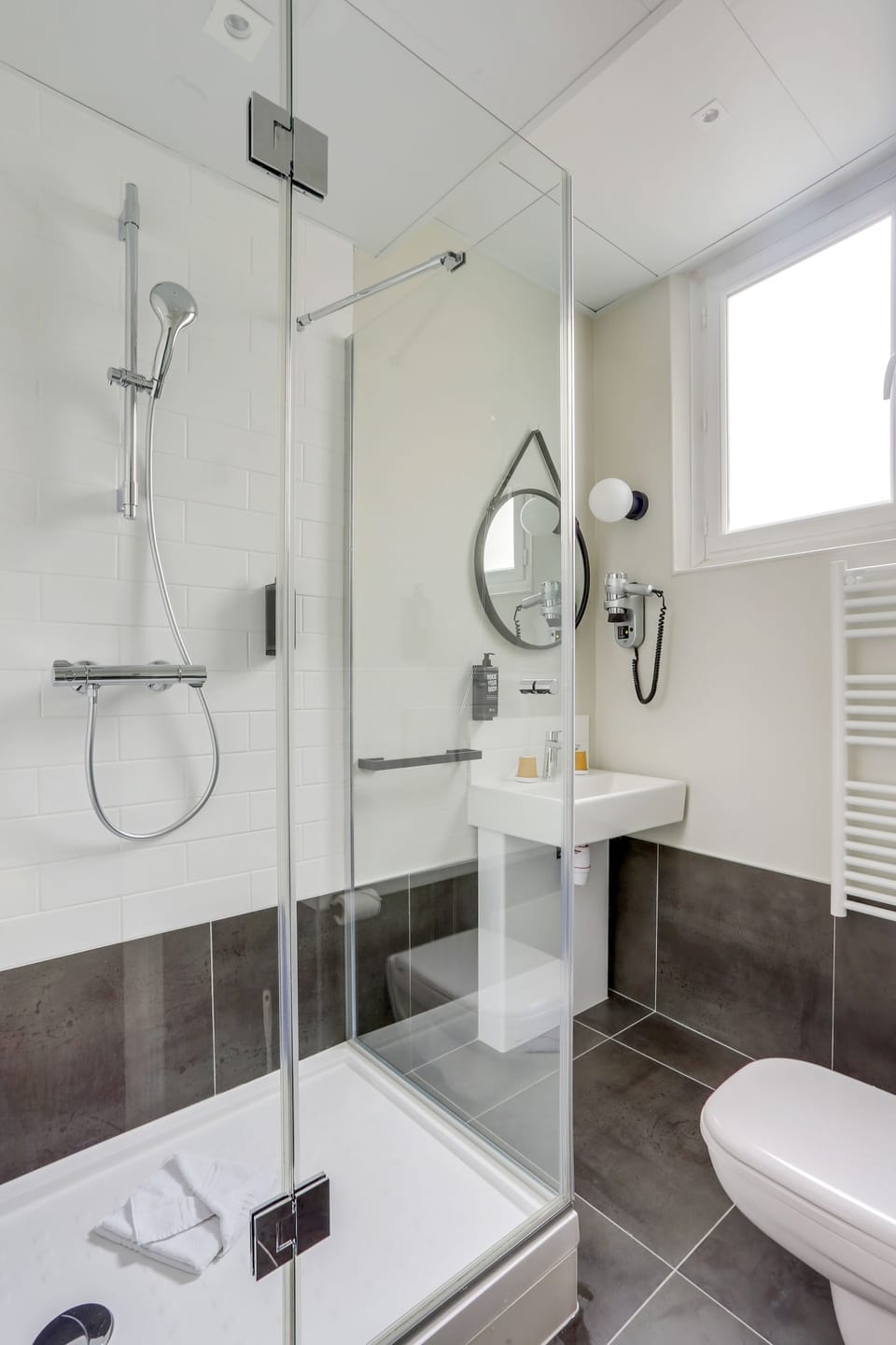 Shower, eco-friendly toiletries, hair dryer, towels