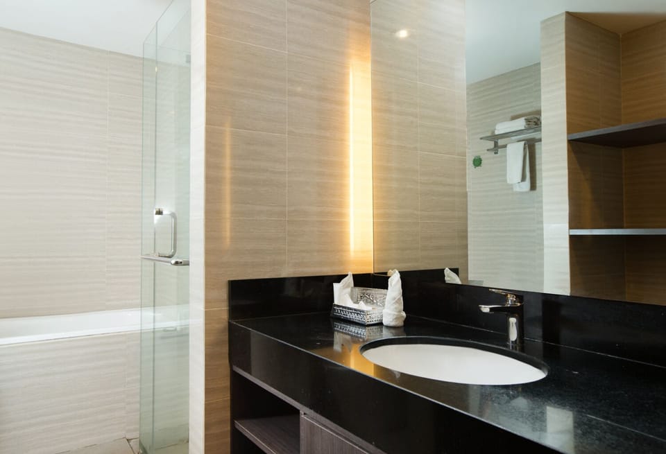 Junior Room | Bathroom | Shower, slippers, towels, soap