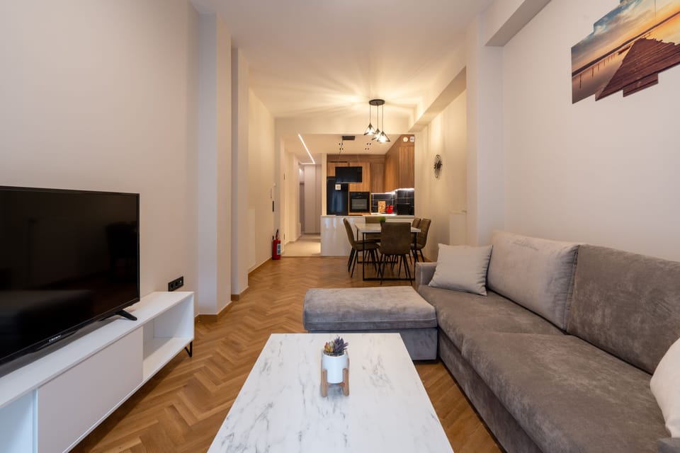 Deluxe Apartment, 2 Bedrooms, 2 Bathrooms | Living area | 43-inch Smart TV with cable channels, TV