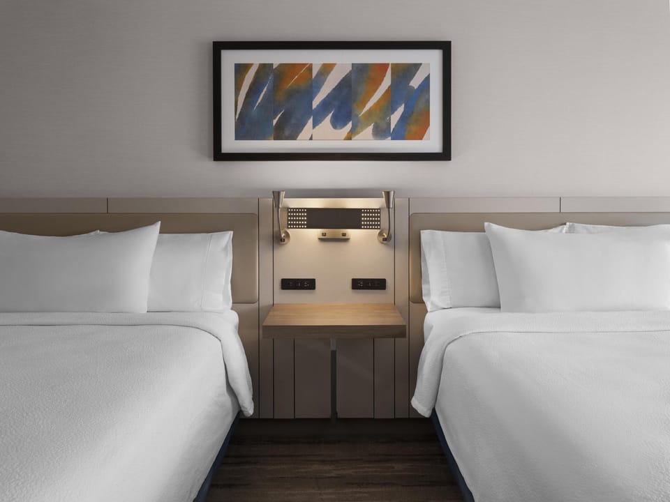 Hypo-allergenic bedding, in-room safe, desk, blackout drapes