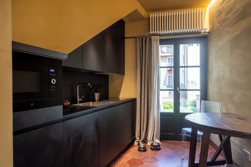 Deluxe Condo, Garden View | Private kitchen | Fridge, dishwasher, espresso maker, coffee/tea maker