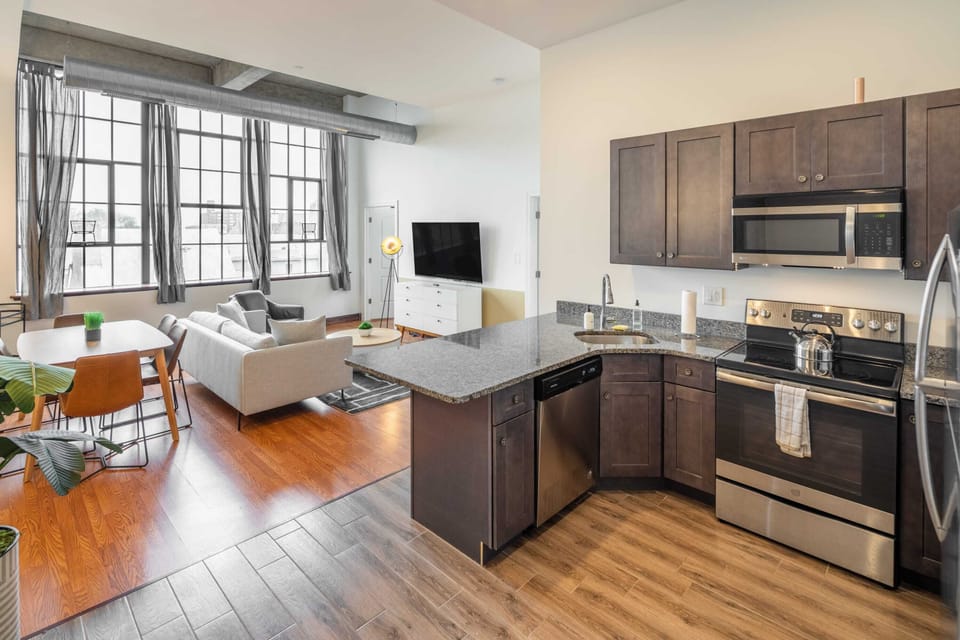 Enjoy home-cooked meals or that tasty take out with this lovely kitchen with a full-sized refrigerator