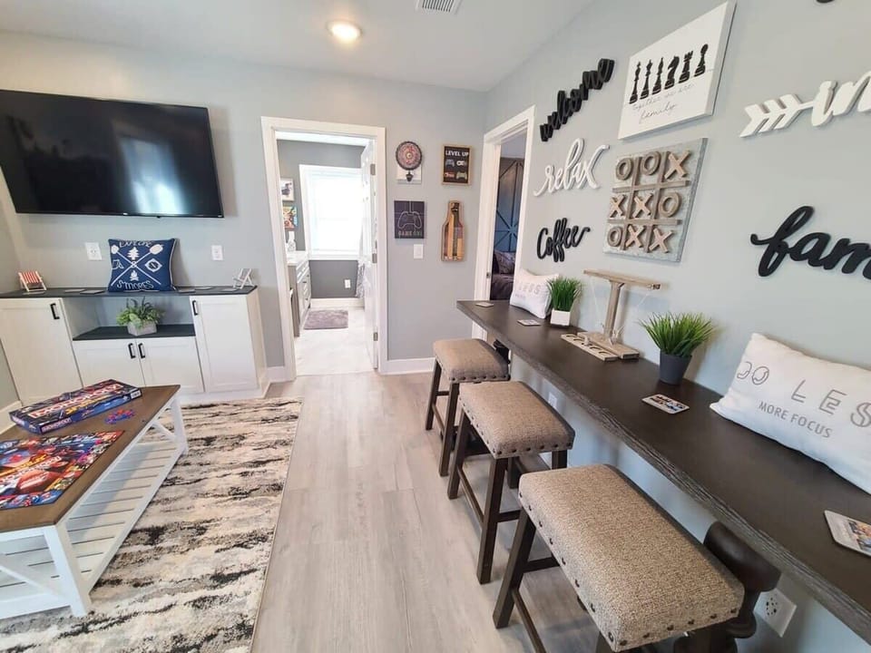 55" TV, games and seating in second floor living room / game room 