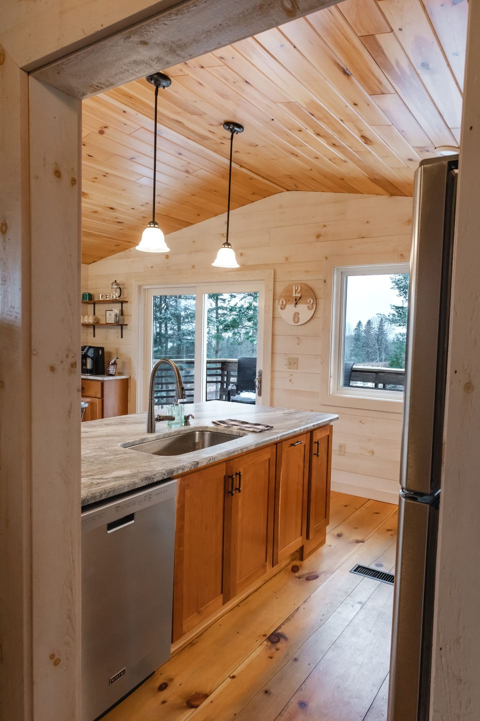 Kitchen includes a full fridge, electrice stove & oven, and dishwasher