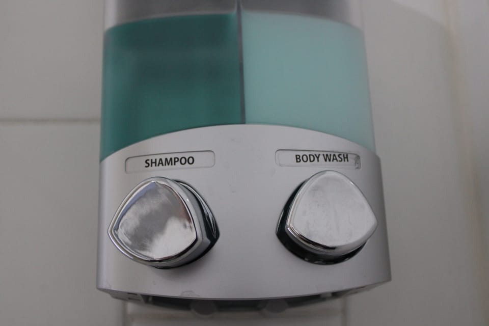 Body Soap and Shampoo Provided in Shower