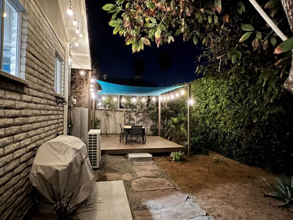 Backyard and Patio with Outdoor Dining Area