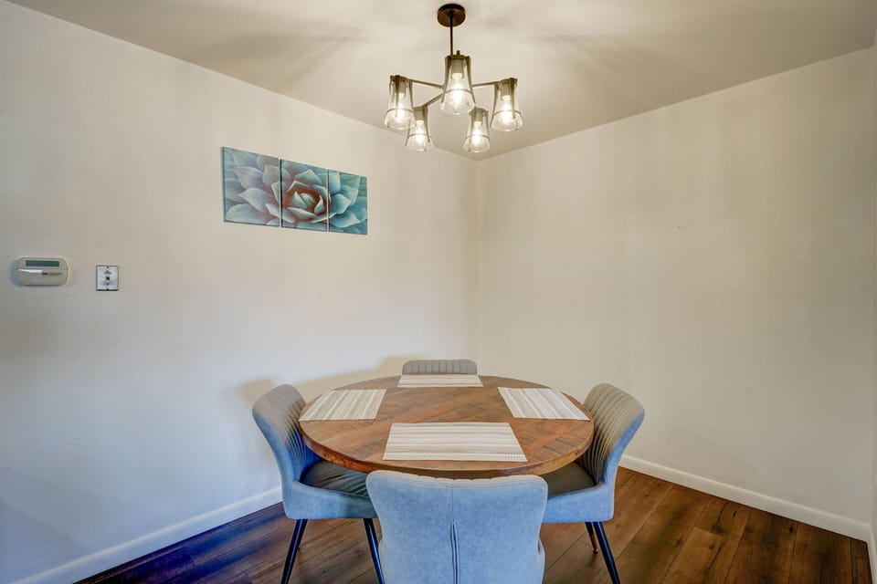 Enjoy Dining in this space.  We love the table and chairs.