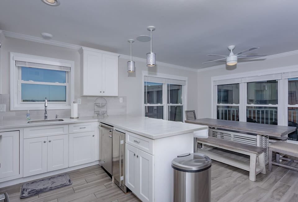 Kitchen w/ ss appliances, ice maker, dishwasher, refrig, elec range/oven, coffee