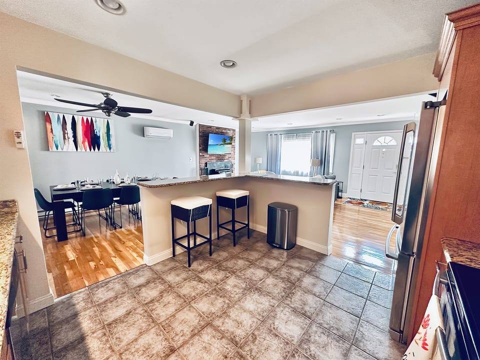What's better than enjoying a delicious home-cooked meal while taking in the beautiful view of your open living and dining room?