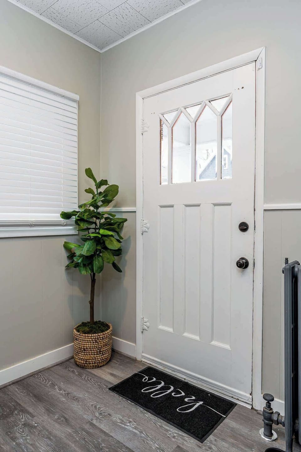 Side door entrance, leading right up stairs to the bedrooms.