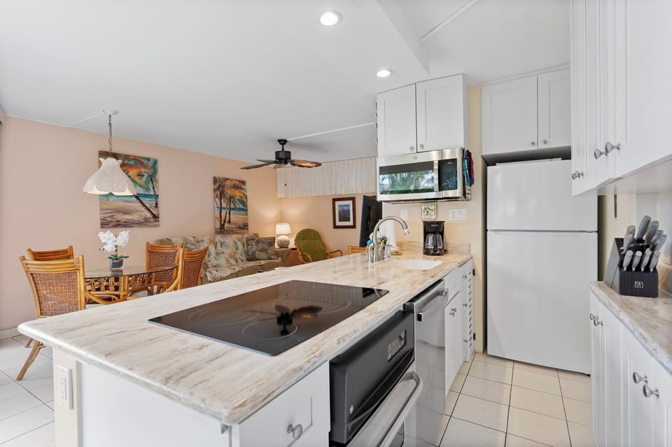 The family chef has oven~ stove and microwave at their finger ti