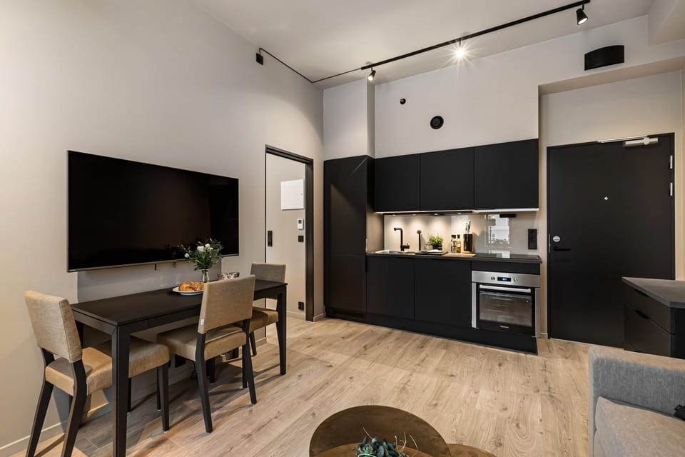 Standard Apartment, 1 Bedroom | Living area | 50-inch TV with cable channels