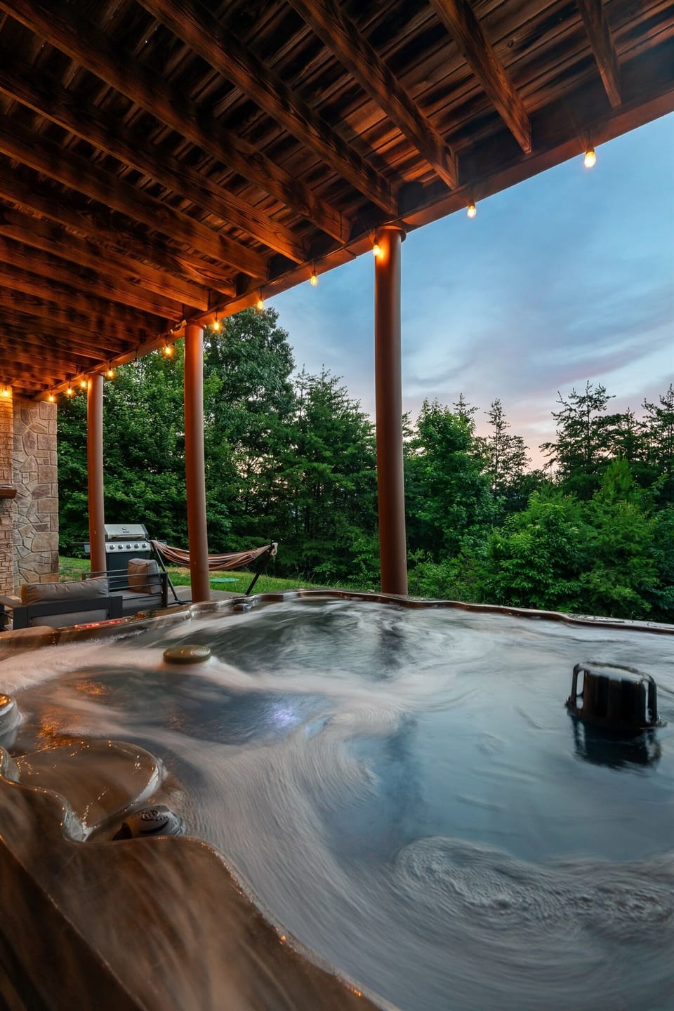 Unwind and watch the sunset while relaxing in the hot tub