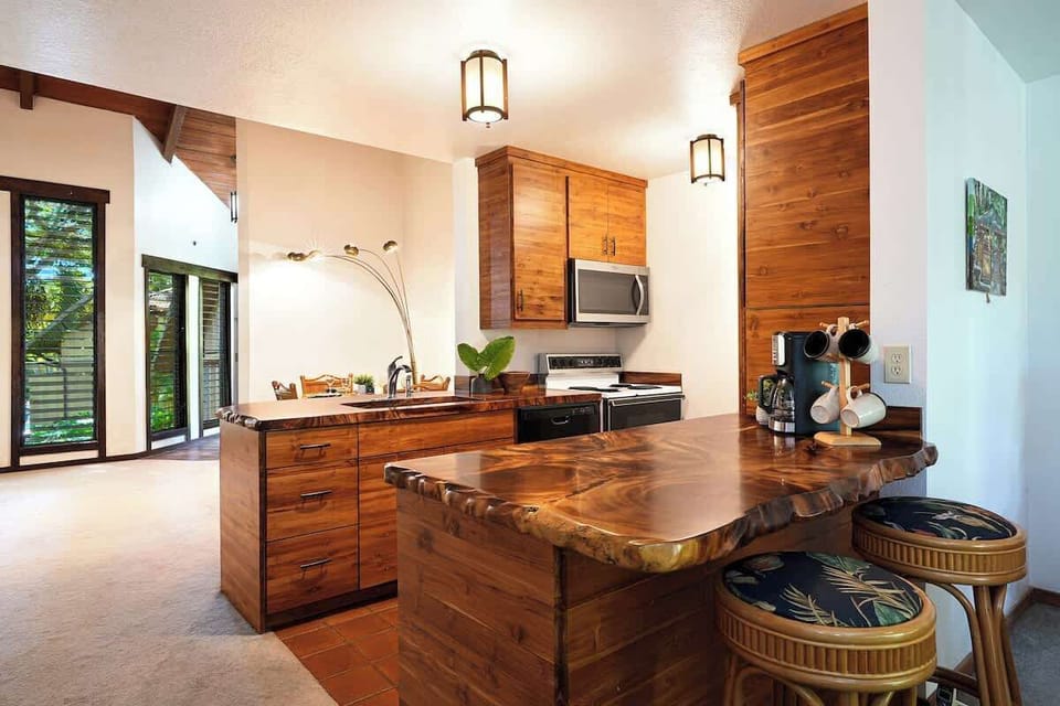 Custom wood kitchen and cabinets giving special Kauai design.