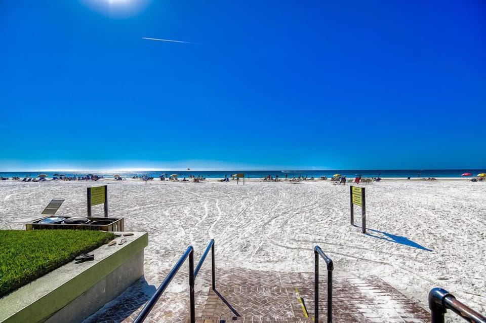 Beautiful sandy beach steps away