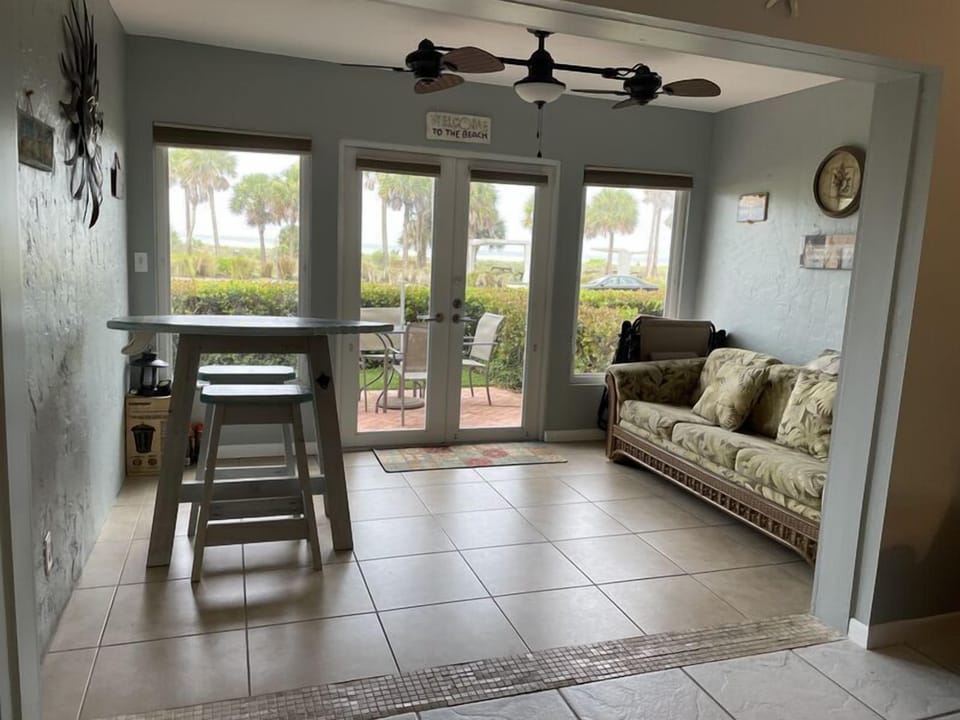Living Room with doors opening to your private patio