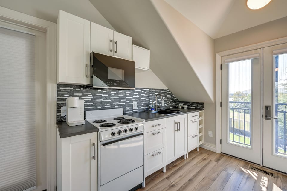 Kitchen | Stove/Oven | Mini Fridge | Keurig Coffee Maker | Microwave