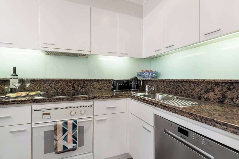 Kitchen facilities with electric stove and oven, microwave, fridge / freezer, dishwasher, coffee machine, milk warmer, kettle, toaster, all cook-ware and cutlery provided.