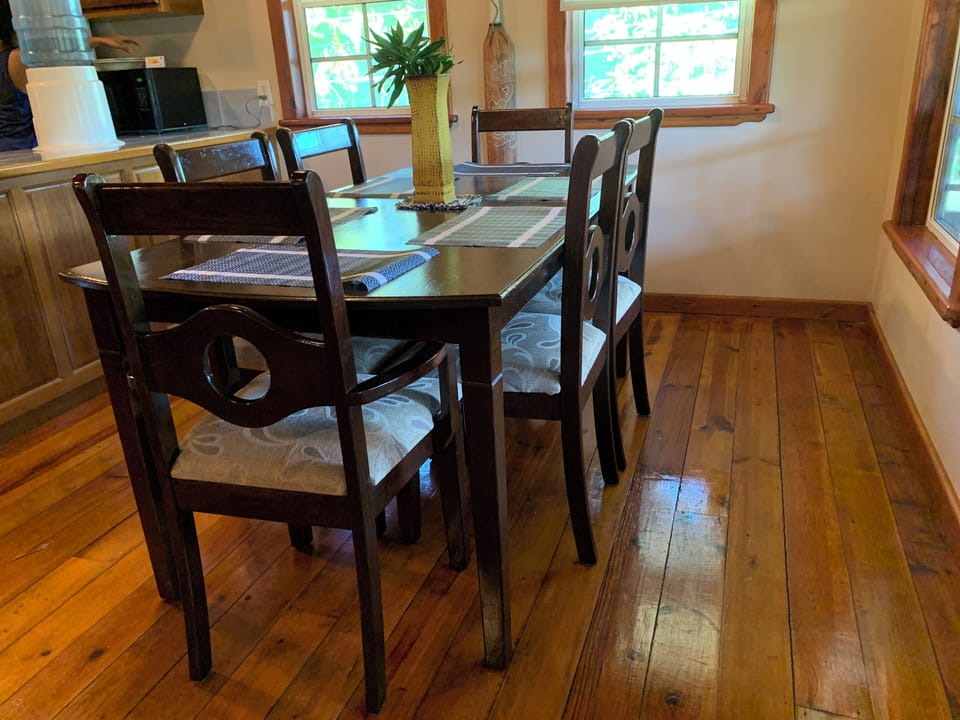 The Dining Area is part of the Great Room, yet distinct as it's own gather area.