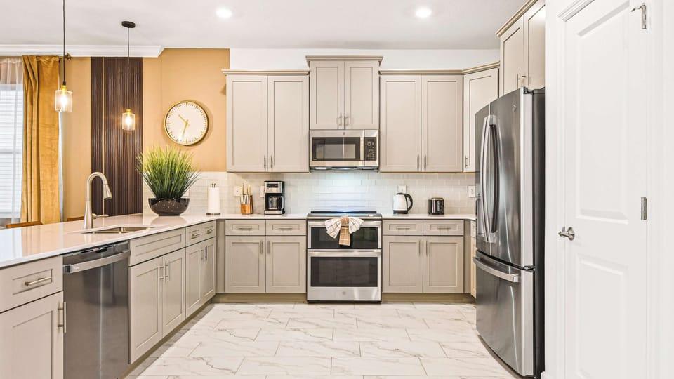 Unleash your inner chef in our modern kitchen, complete with top-of-the-line appliances for your convenience.