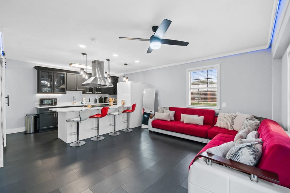 Living Area with Sleeper Sofa and Large Flat Screen TV