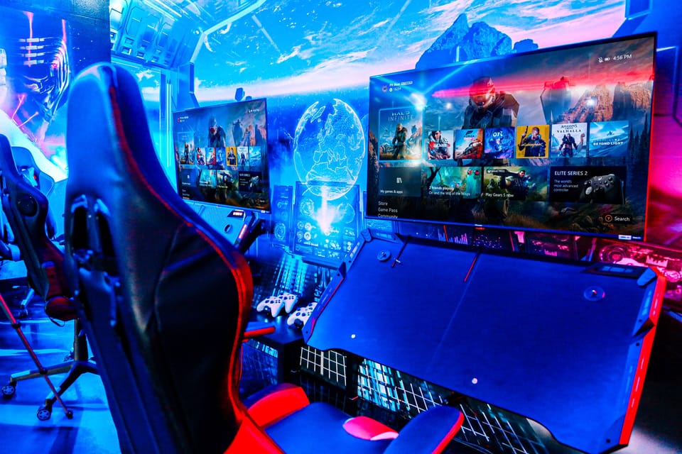 2 Xbox's with 4 Gaming Chairs