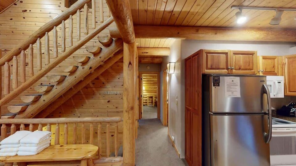 Hallway from the kitchen to access the other rooms on the main level.