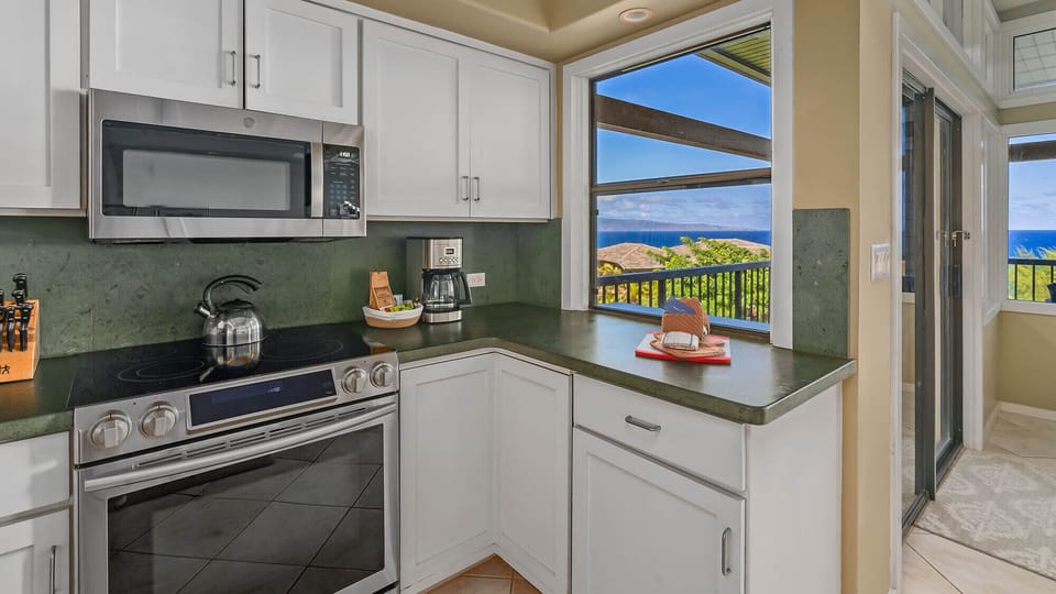 Kapalua Ridge Villas #1112 - Kitchen & Lanai Ocean View - Parrish Maui