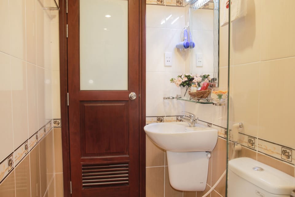 Shower, free toiletries, hair dryer, slippers