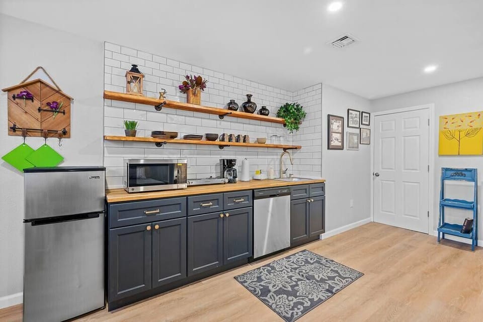 A fully functioning kitchen offers a fridge, dishwasher, conviction oven/microwave and two burner electric cook top.  Plenty of glassware for your stay and a drip coffee maker