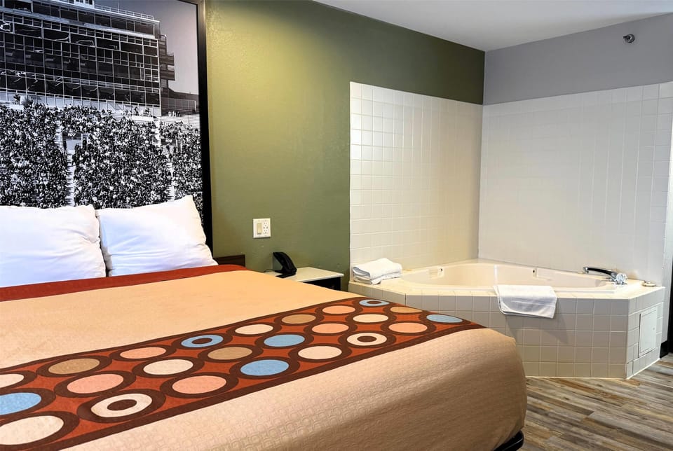 Studio Suite, 1 King Bed, Non Smoking, Microwave | Desk, laptop workspace, blackout drapes, iron/ironing board