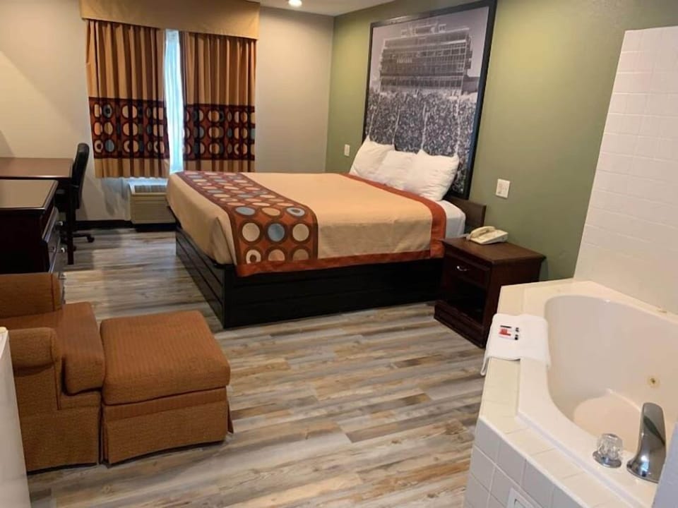 Studio Suite, 1 King Bed, Non Smoking, Microwave | Desk, laptop workspace, blackout drapes, iron/ironing board