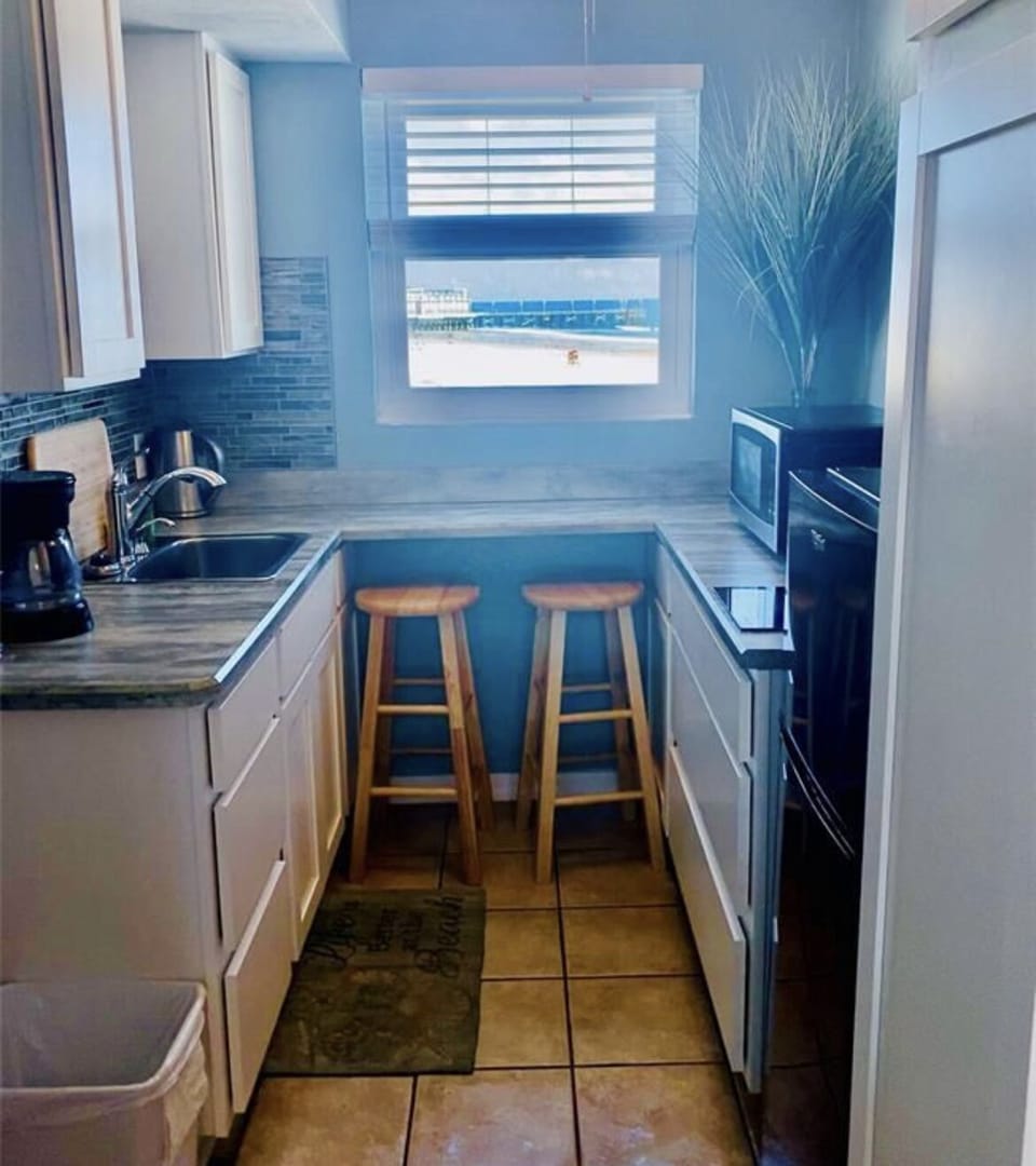 Ocean 🌊 and pier 🎣 view from your kitchenette 