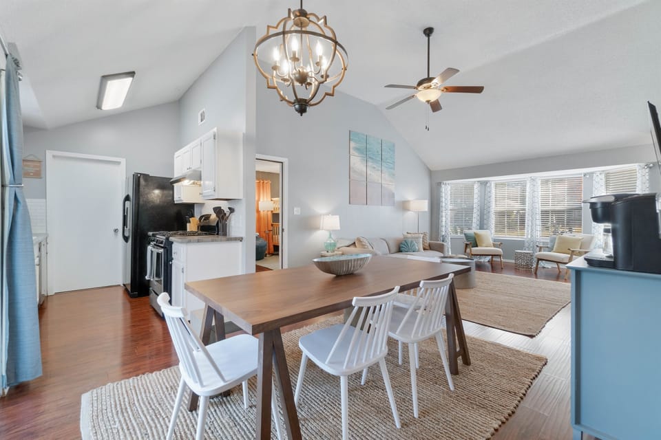 Heading over to the other side of the main hub area, you can really feel the spacious open thoughtful plan of the home here, perfectly brought to life by the high vaulted ceilings allowing for that extra spacious feeling