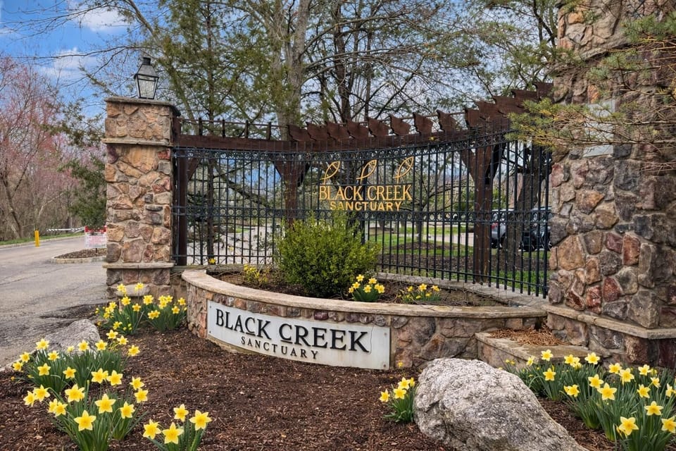 Secure gated entrance welcoming you to Black Creek community