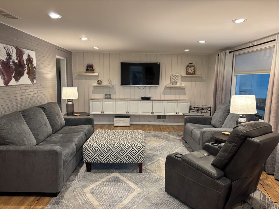 Living room sofa folds out to a queen size bed