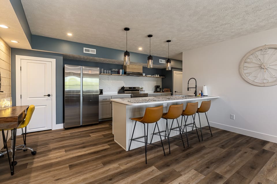 Fully stocked kitchen with seating