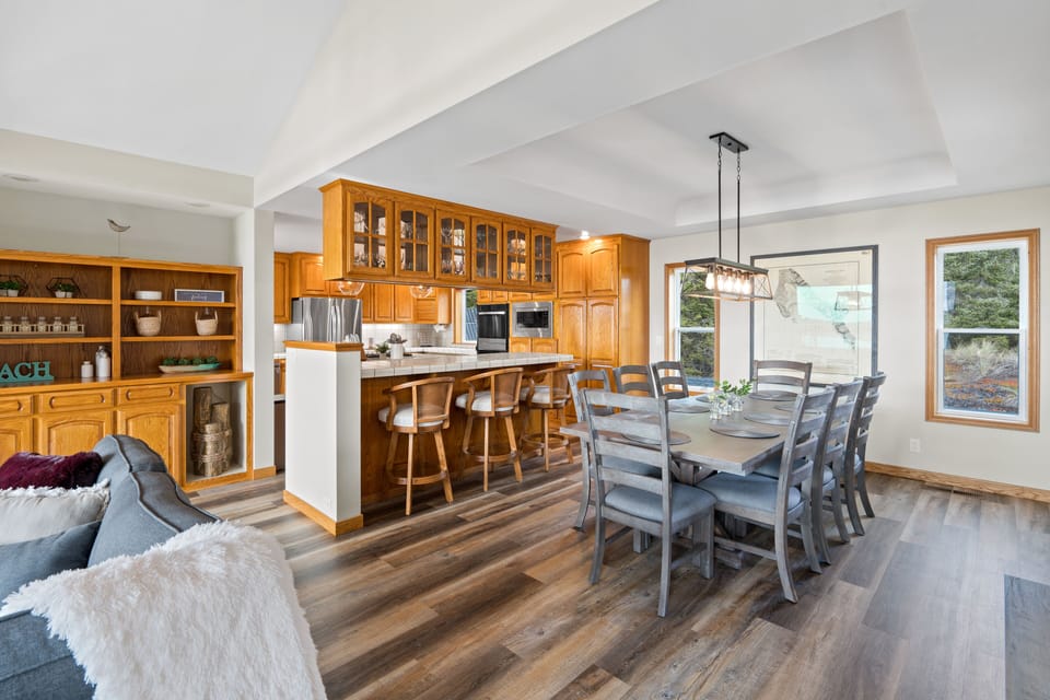 Kitchen counter with seating and dining room table