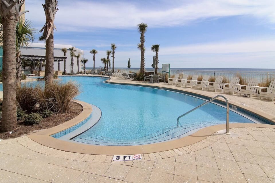 The AQUA RESORT features two elevated pools with views of the beach and the Gulf of Mexico - Plenty of seating and lounge space!