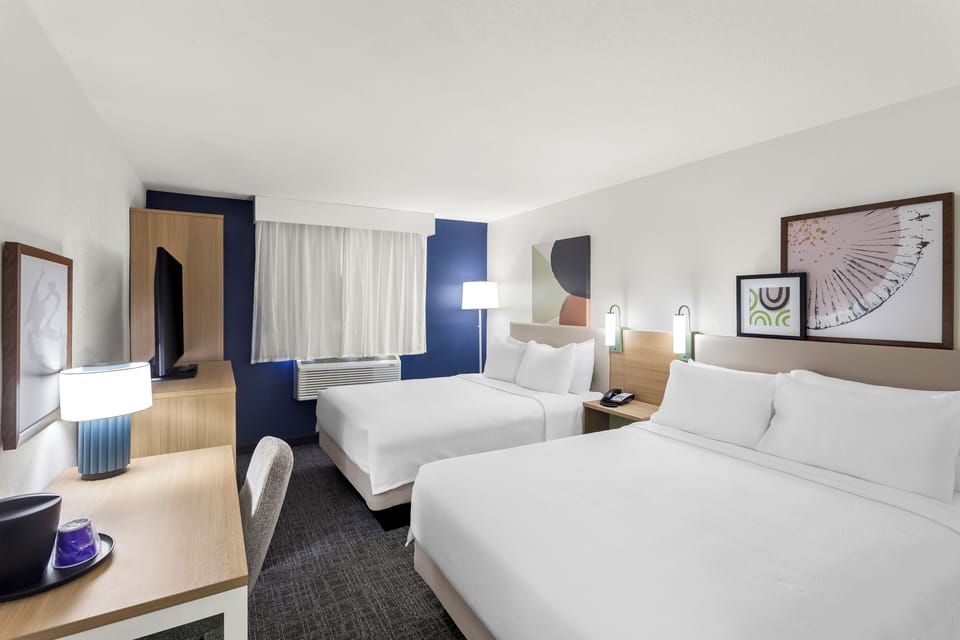 Room, 2 Queen Beds | Iron/ironing board, free cribs/infant beds, free WiFi, bed sheets