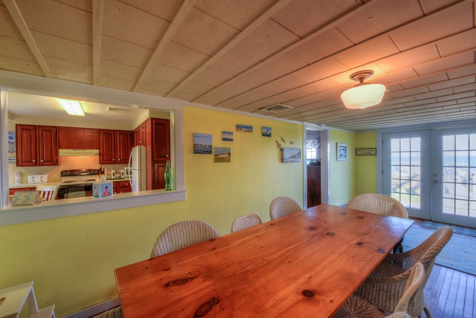 Dining room seating eight guests.
