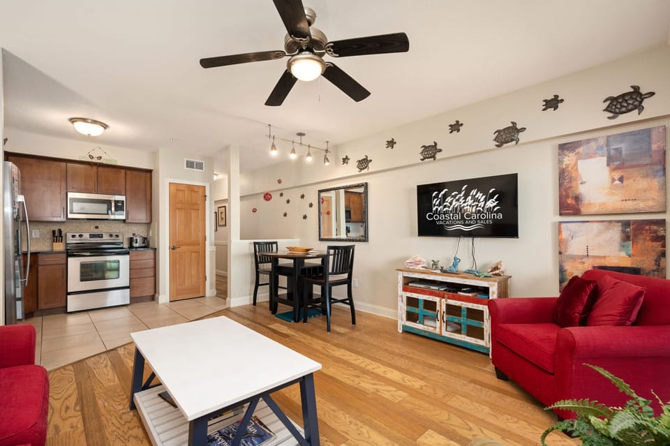 FF215: First Flight Retreat 215 | Kitchen, Dining & Living Area