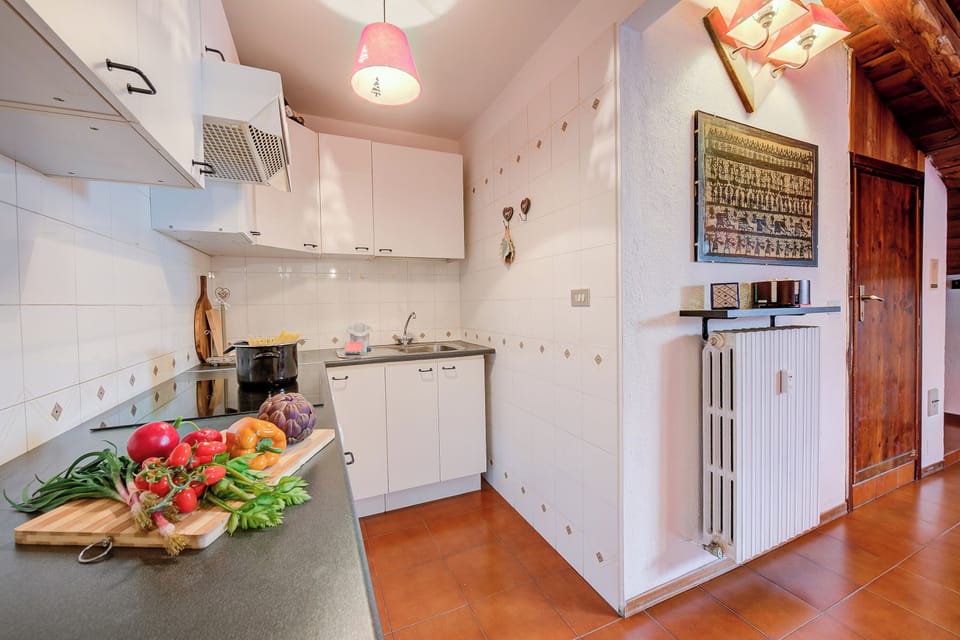 Family Apartment, Multiple Bedrooms (Le Meublé (between City Center &) | Private kitchen | Fridge, oven, stovetop, coffee/tea maker