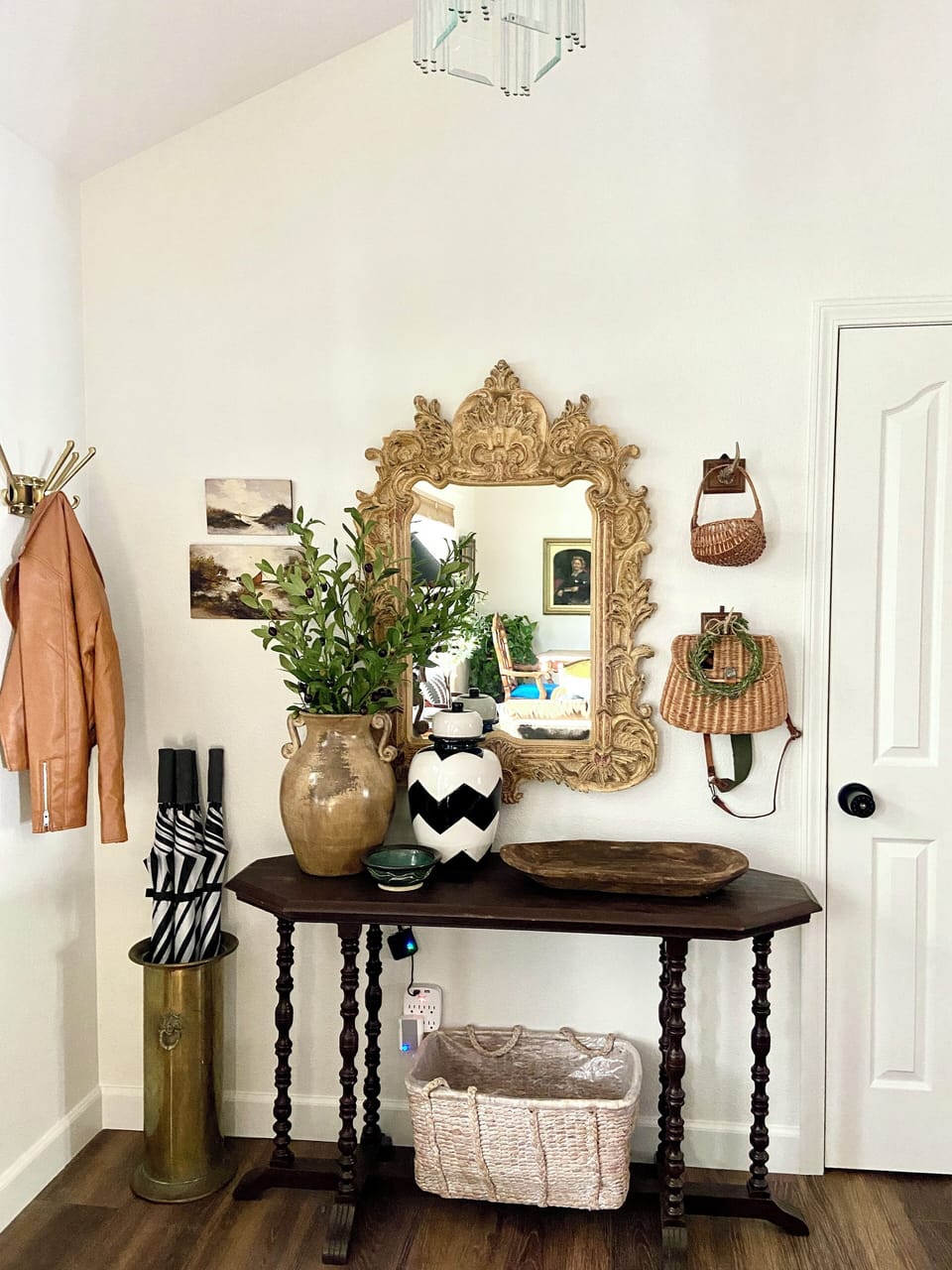 A place for keys, shoes and jackets.  We have large umbrellas available to use.