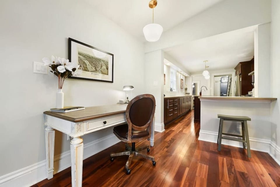 Dedicated workspace with an ergonomic chair and charging port.