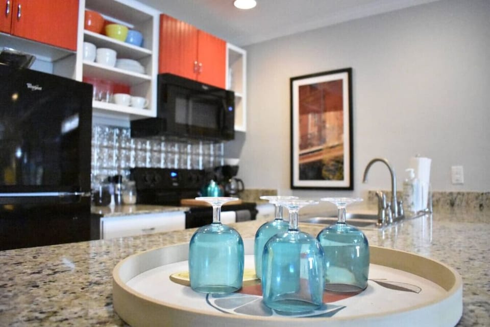 Enjoy the kitchen and bar area while cooking a meal