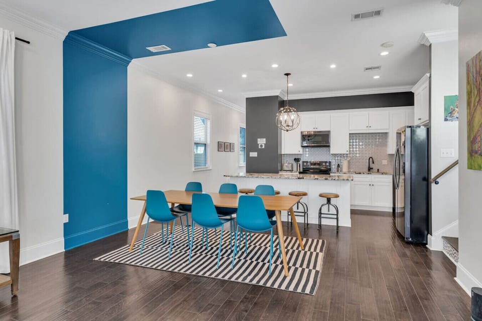 Eclectic decor throughout downstairs living/dining/kitchen open space