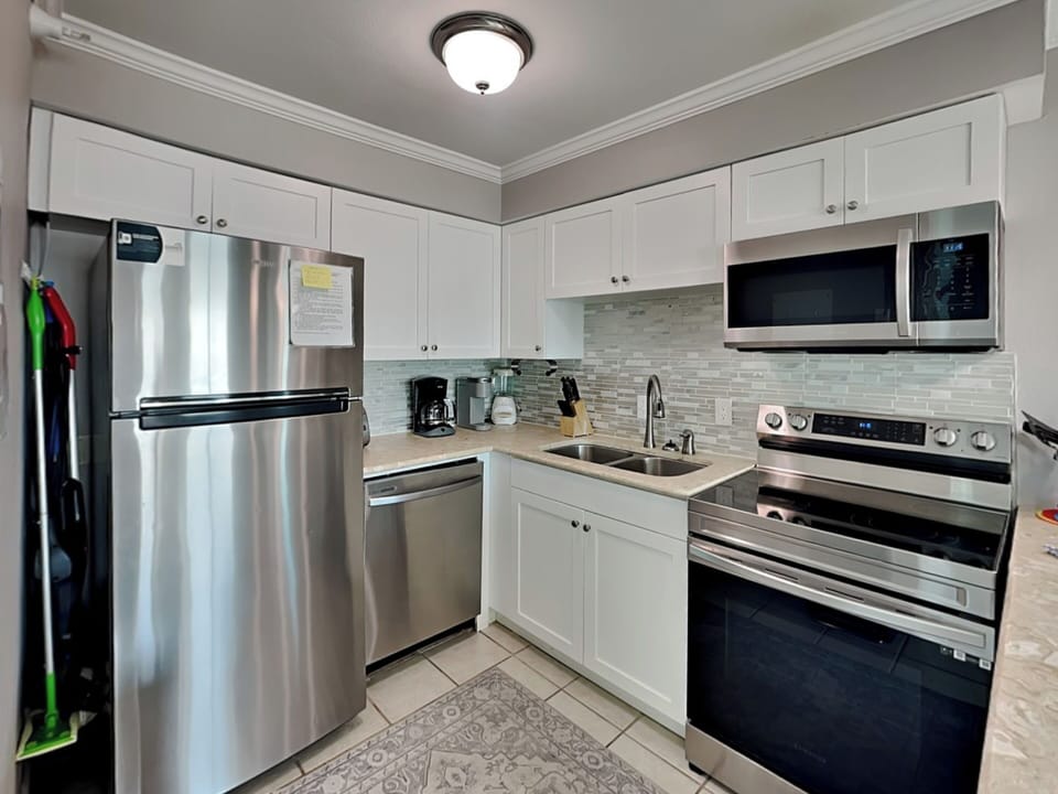 Fully Equipped Kitchen with Stainless Steel Appliances