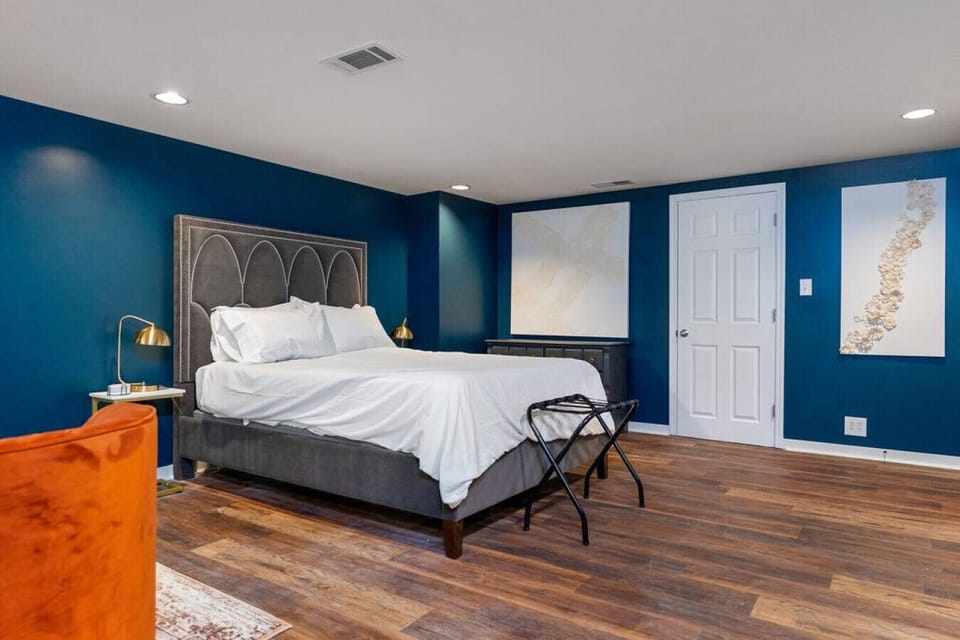 View of the sleeping area from the stairs leading into the space,